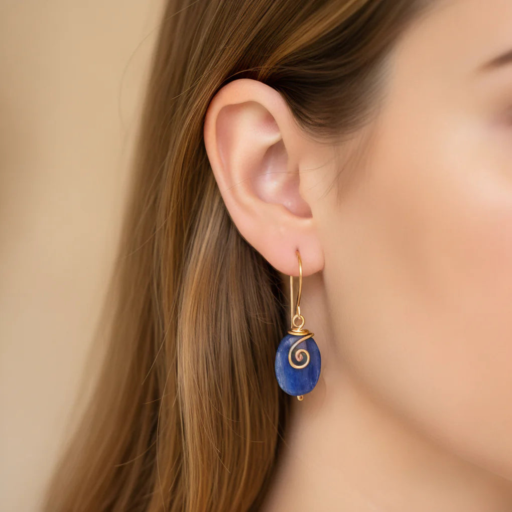 Kyanite Universe Earrings featuring handcrafted kyanite stones and gold-filled spiral wire wrap.