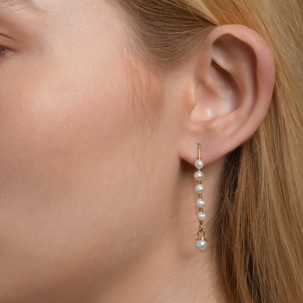 Long Pearl Spirali Earrings with high-quality pearls and gold-filled accents, handcrafted design.