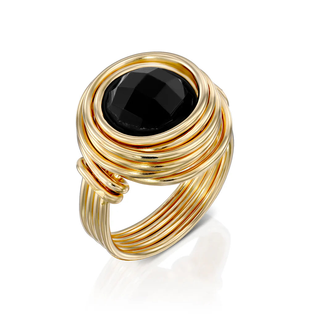 Universe Onyx Ring featuring a large faceted black onyx stone set in high-quality gold-filled spirals