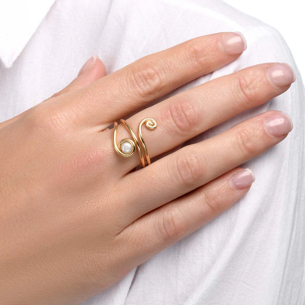 Universe Snake Pearl Ring worn on hand – sculptural spiral statement ring