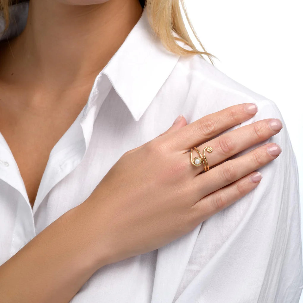 Universe Snake Pearl Ring worn on hand – sculptural spiral statement ring2