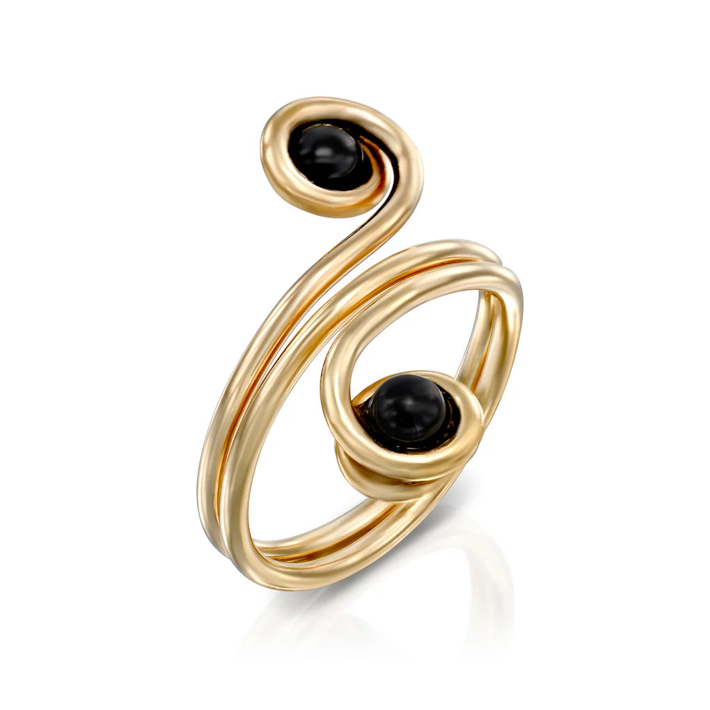 Universe Swirl Onyx Ring featuring two natural black onyx stones set in flowing gold-filled spiral design