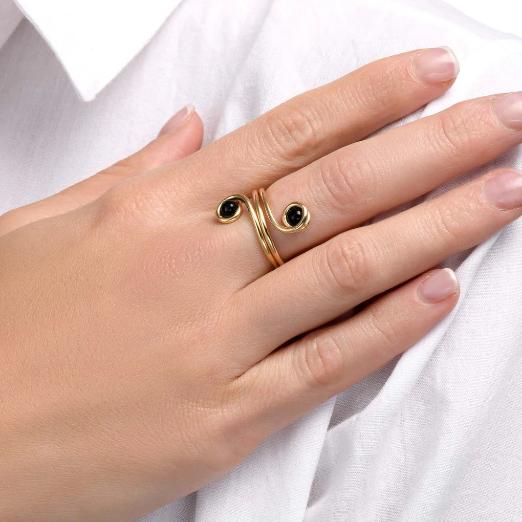 Universe Swirl Onyx Ring worn on hand – bold double-spiral statement ring
