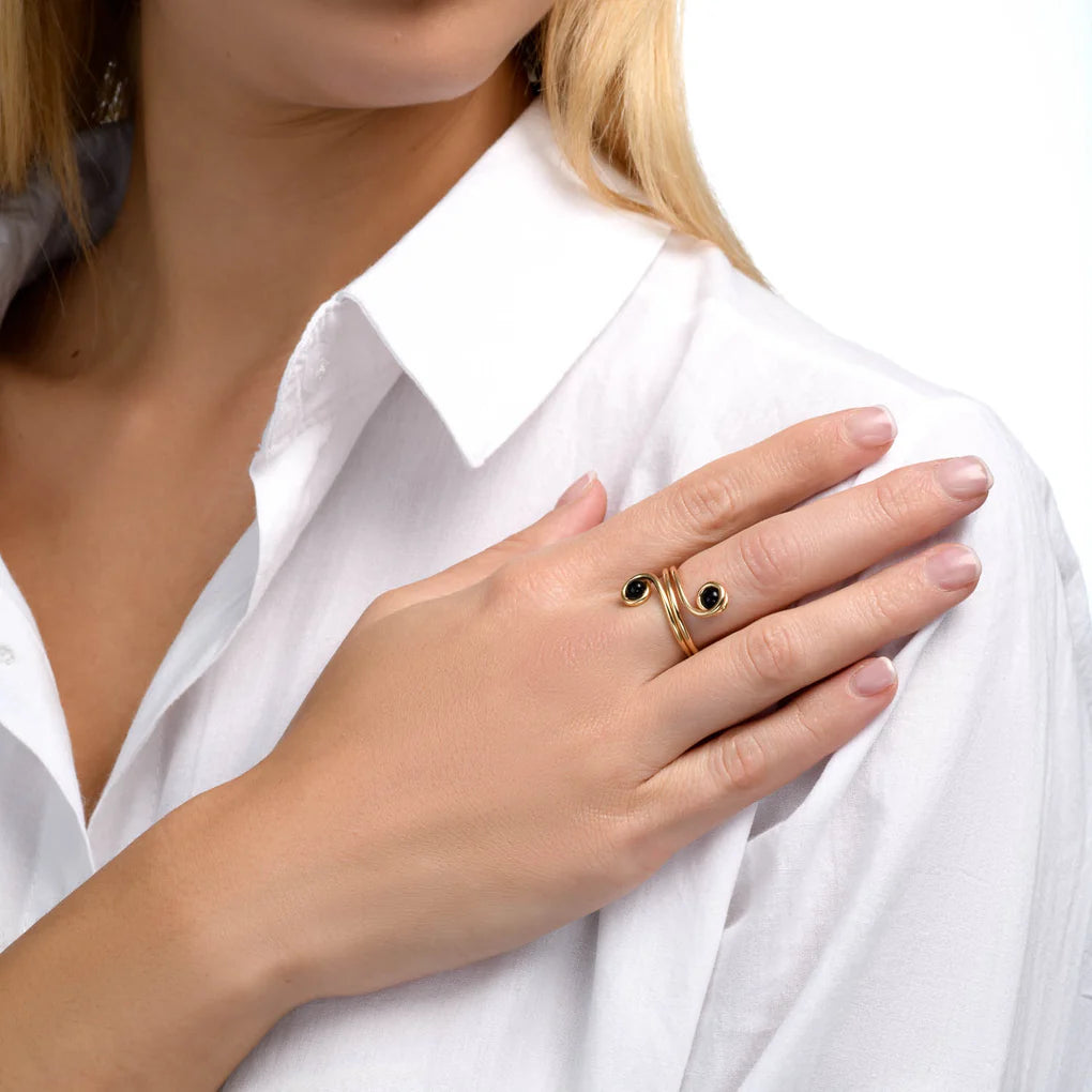 Universe Swirl Onyx Ring worn on hand – bold double-spiral statement ring