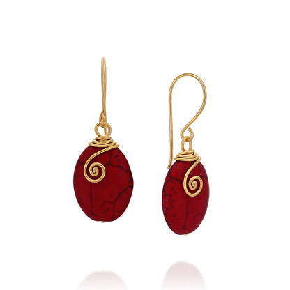 Red Coral Universe Earrings featuring handcrafted red coral stones and gold-filled spiral wire wrap.